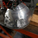 More corner damage. That is solid 6061 trying to absorb a lot of energy. Need bigger bolts.